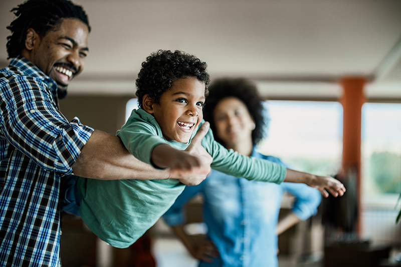 family with father holding a son with mother in the background/> </p>
<p>Households will get even more relief aid under the new stimulus package with <a href=