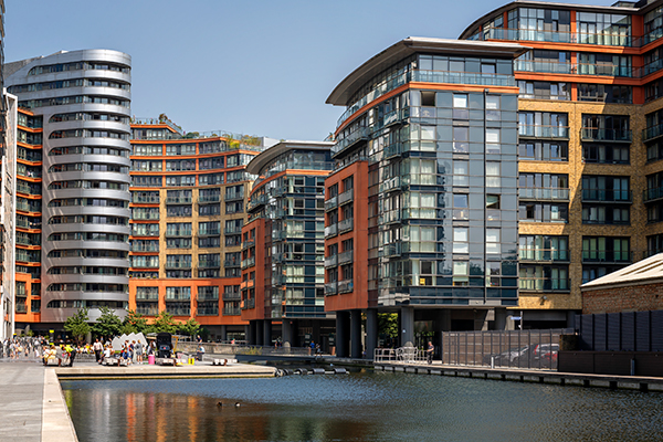 Photo showing a multifamily apartment building property; an asset class for real estate investors which has been stable through the pandemic.