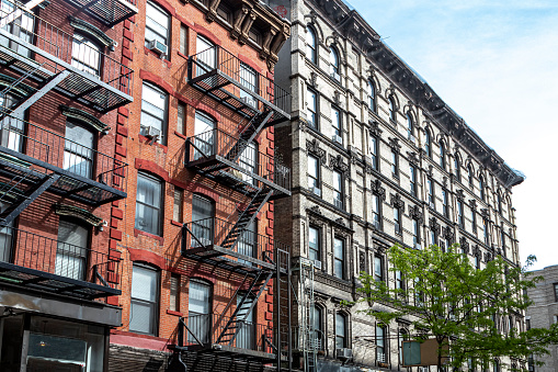 A mid-rise apartment building in New York City. Various factors, such as property’s size or location, can affect cap rates.